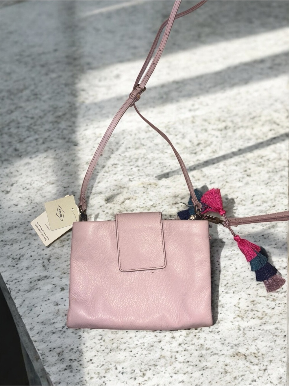 NWT pink fossil crossbody no longer in production so you can’t buy this in store